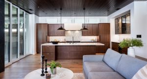 Kitchen remodel with a big island and beautiful kitchen hood. Zieba Builders, Long Beach, CA